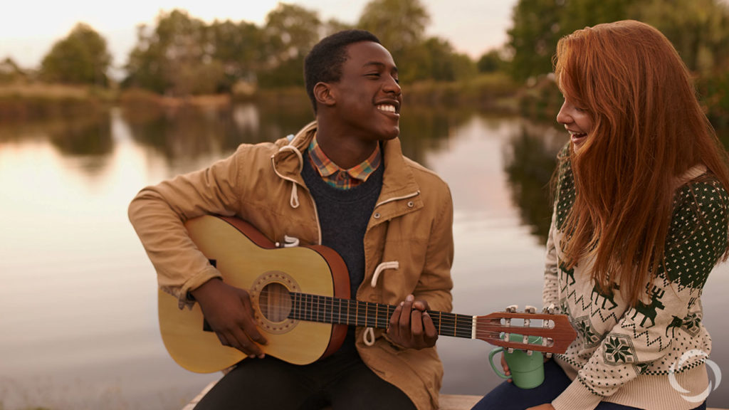 acoustic guitar and male and female