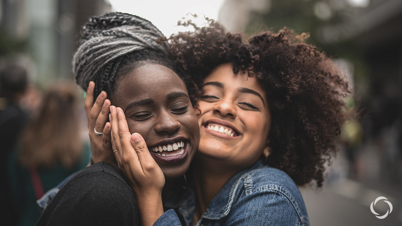 two women smiling