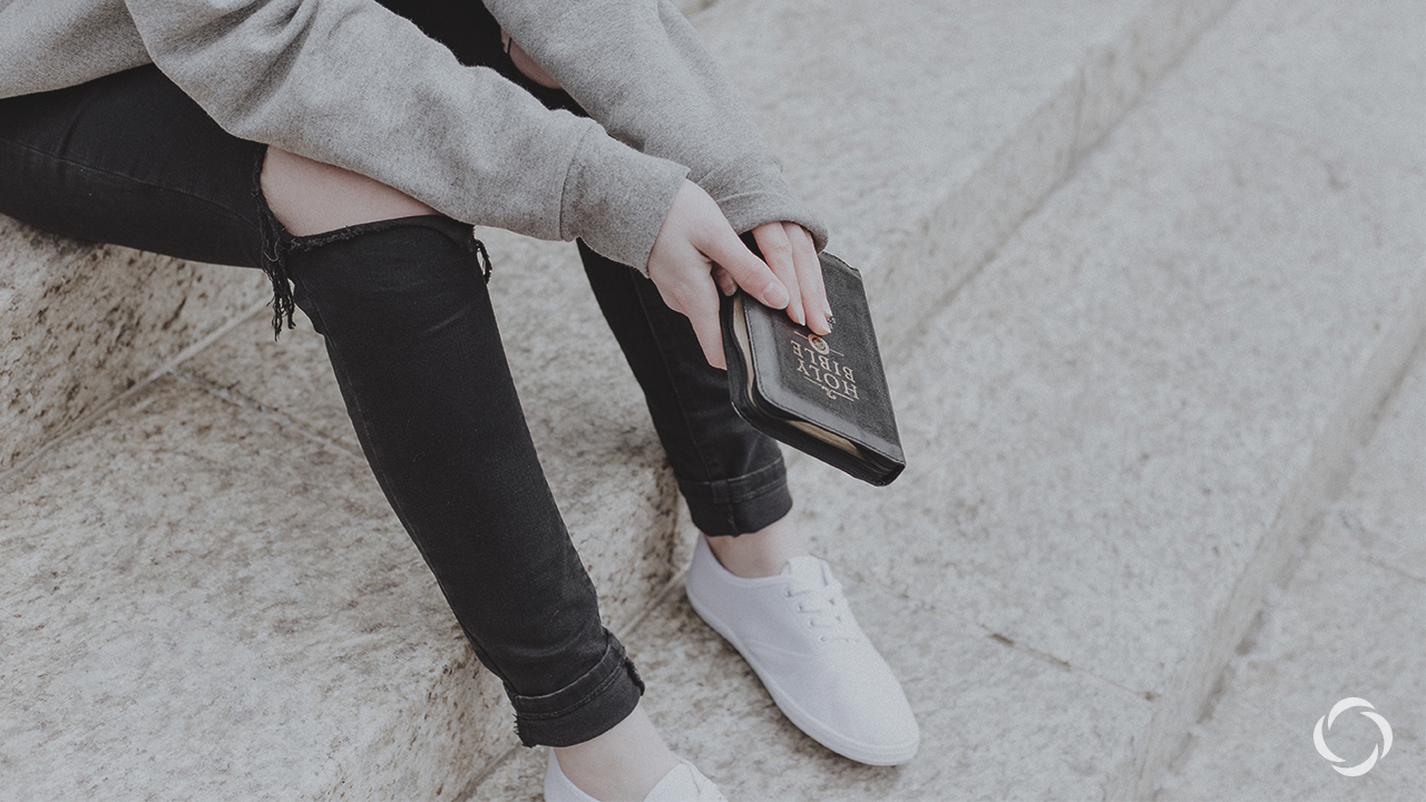 Woman holding a bible