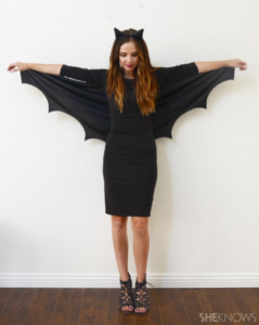 A woman dressed as a bat