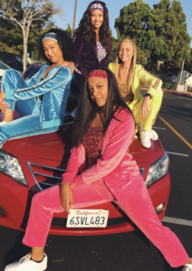 four woman dressed as cheetah girls