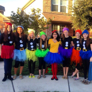 seven woman dressed as dwarves